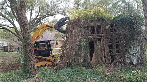 skid steer garage demolition